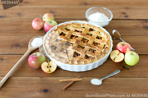 Image of close up of apple pie on wooden table