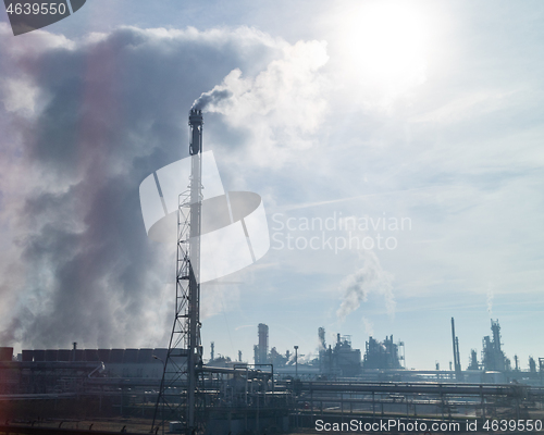 Image of High smokestack with industrial wastes emission on big plant in Budapest, Hungary.