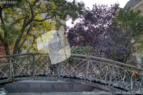 Image of The Imre Nagy statue on a bronze walking bridge in Budapest, Hungary.