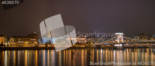 Image of Night lighting view to the historical part and Chain bridge across the river in Budapest, Hungary