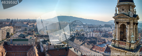 Image of Panoramic aerial view to historical part of Budapest with bell tower.