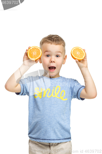 Image of Full length portrait of cute little kid in stylish clothes with orange