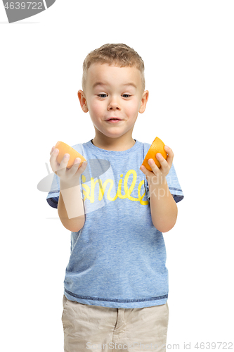 Image of Full length portrait of cute little kid in stylish clothes with orange