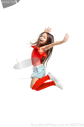 Image of Cute little girl jump. Studio shot. White background