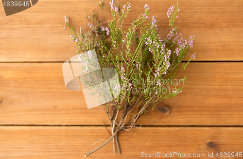 Image of heather bush on wooden table