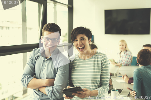 Image of business People Working With Tablet in office