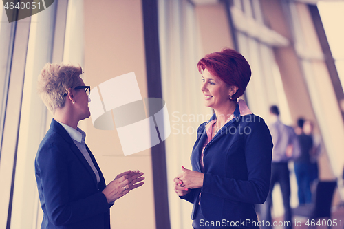 Image of business woman goup at modern bright office