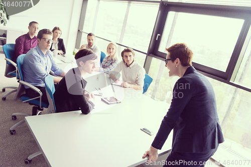 Image of Group of young people meeting in startup office