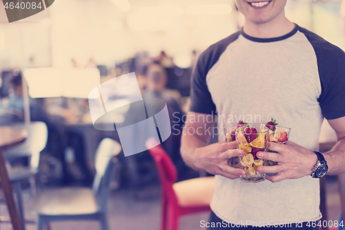 Image of software developer eating a fruit salad