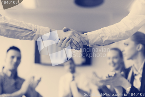 Image of business womans handshake