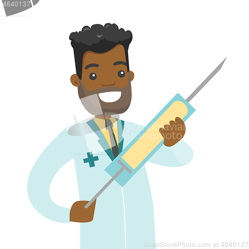 Image of African doctor holding a syringe with vaccine.