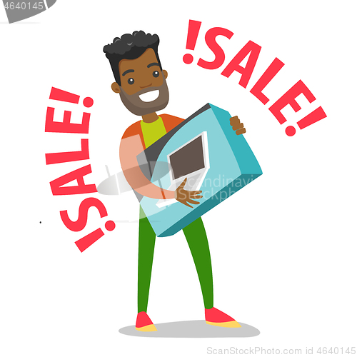 Image of Young african-american man doing shopping on sale.