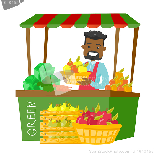 Image of African street seller with fruits and vegetables