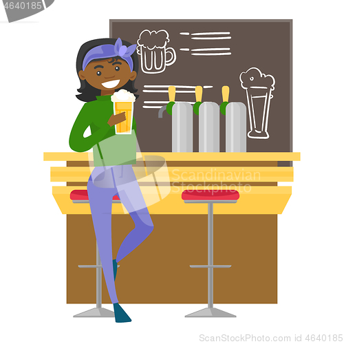 Image of African-american woman drinking beer at the bar.