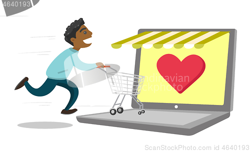 Image of Young african-american man shopping online.