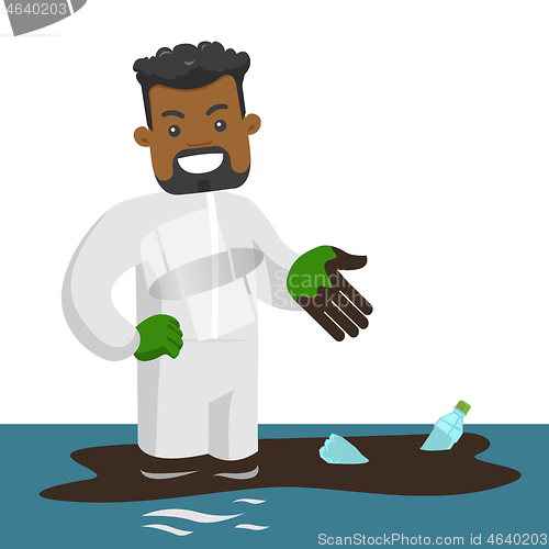 Image of Man standing in water with oil spill and bottles.