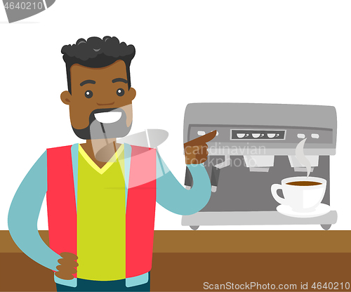 Image of Young african-american man making coffee.