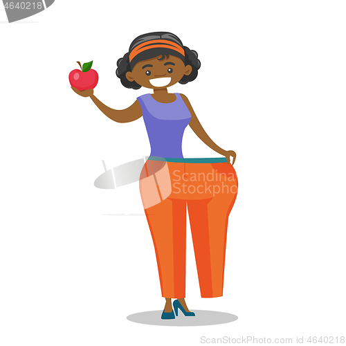 Image of Slim woman in pants showing the results of diet.