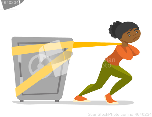 Image of African-american college student pulling a safe.