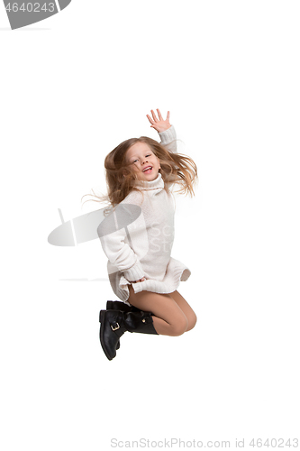 Image of Cute little girl jump. Studio shot. White background