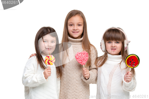 Image of portrait of cute little kids in stylish clothes looking at camera and smiling