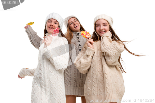 Image of portrait of cute little kids in stylish clothes looking at camera and smiling