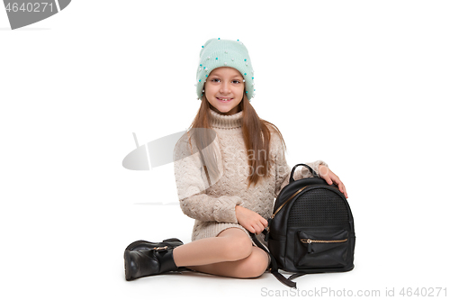 Image of portrait of cute little kid in stylish jeans clothes looking at camera and smiling