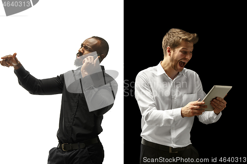 Image of success happy afro and caucasian men. Mixed couple. Human facial emotions concept.