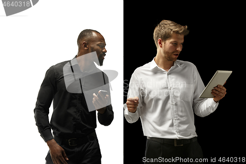 Image of success happy afro and caucasian men. Mixed couple. Human facial emotions concept.