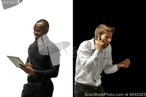 Image of success happy afro and caucasian men. Mixed couple. Human facial emotions concept.