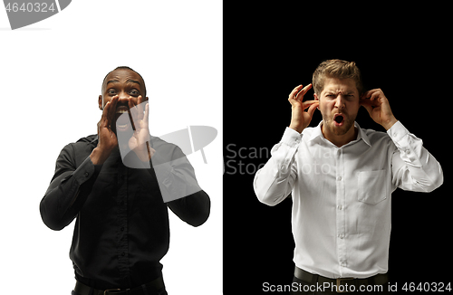 Image of success happy afro and caucasian men. Mixed couple. Human facial emotions concept.