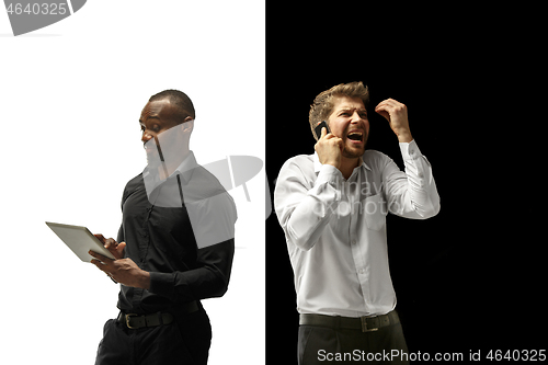 Image of success happy afro and caucasian men. Mixed couple. Human facial emotions concept.