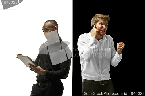 Image of success happy afro and caucasian men. Mixed couple. Human facial emotions concept.