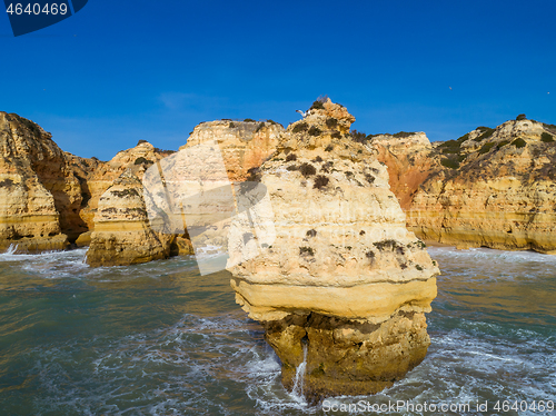 Image of Rock cliffs and waves in Algarve