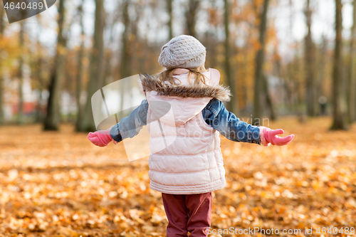 Image of happy girl at autumn park