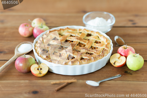 Image of close up of apple pie on wooden table