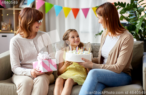 Image of mother, daughter and grandmother on birthday