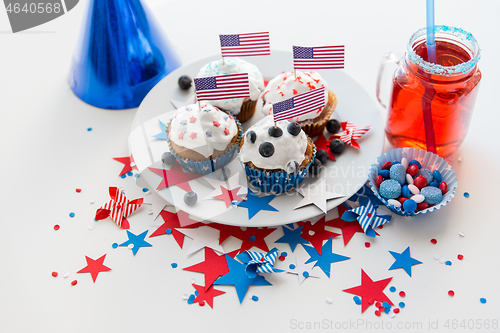 Image of cupcakes with american flags on independence day