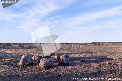 Image of Resting place made of rocks in a great plain landscape