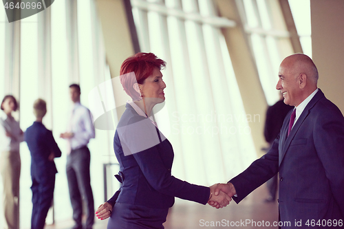 Image of handshake of business woman and man