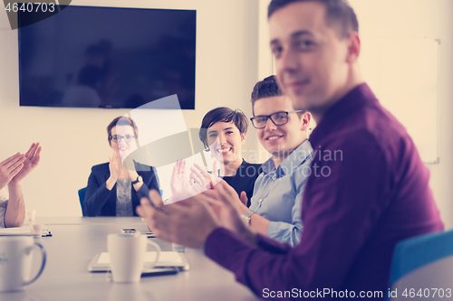 Image of Group of young people meeting in startup office