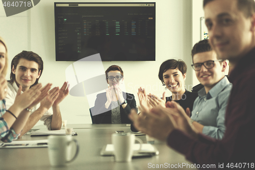 Image of Group of young people meeting in startup office