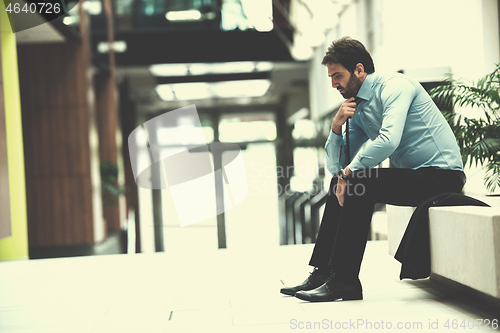 Image of frustrated young business man