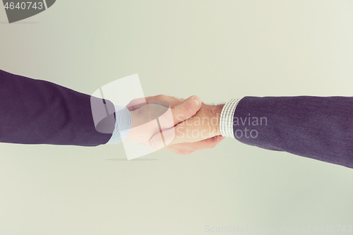 Image of cloasing the deal in modern office interior top view