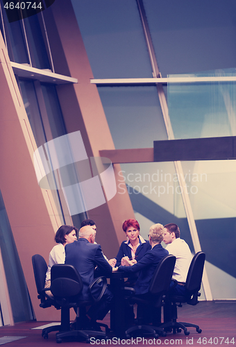 Image of business people group on meeting at modern bright office