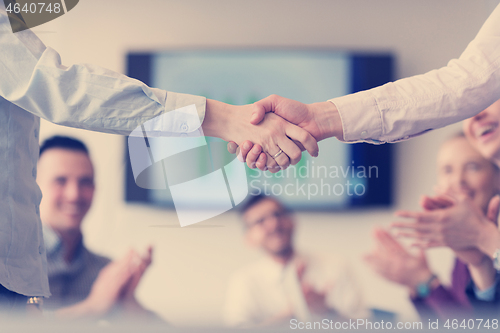 Image of business womans handshake