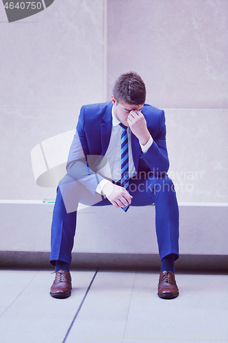 Image of frustrated young business man