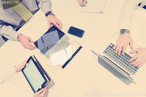 Image of aerial view of business people group brainstorming on meeting