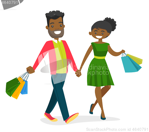 Image of African-american people walking with shopping bags