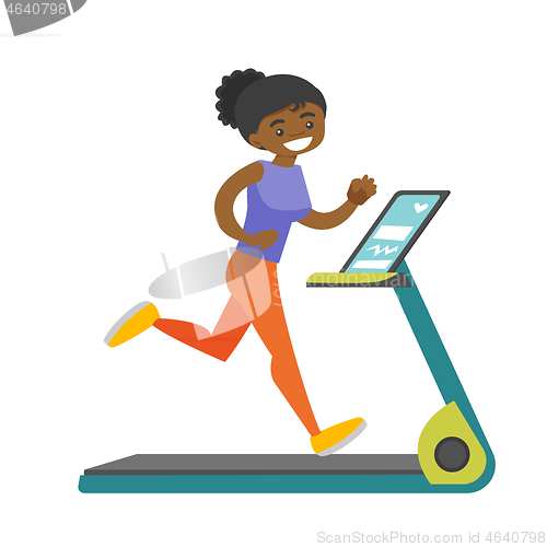 Image of Young african-american woman running on treadmill.